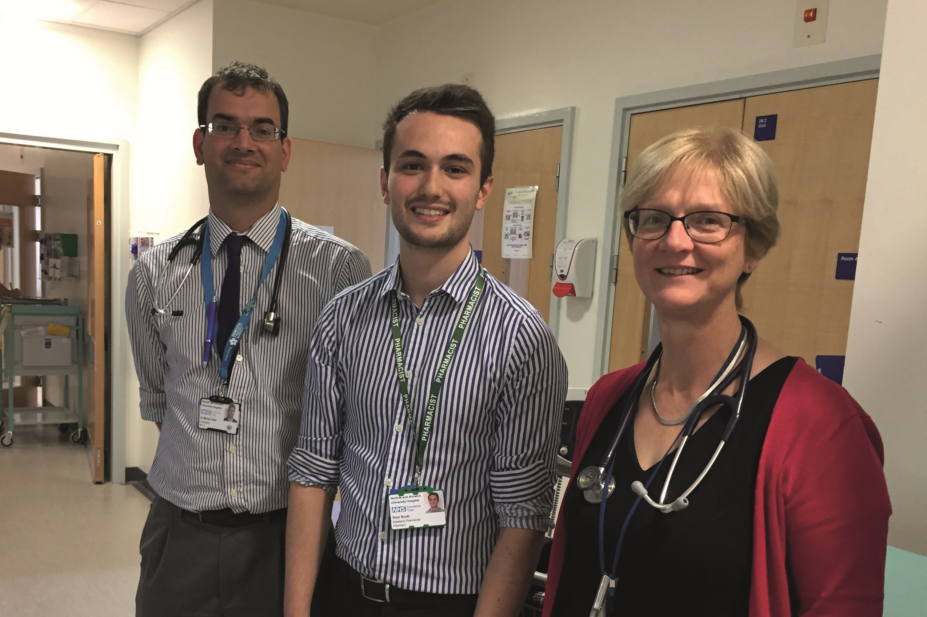 Sion Scott (centre), research student and associate tutor at the University of East Anglia, received the award for a year-long project to develop a model for deprescribing in hospital. He is flanked by Dr Martyn Patel, consultant geriatrician and service