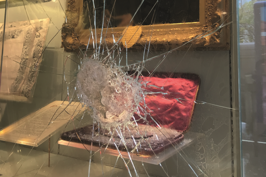 Smashed window in RPS headquarters