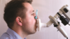 man undergoing spirometry test
