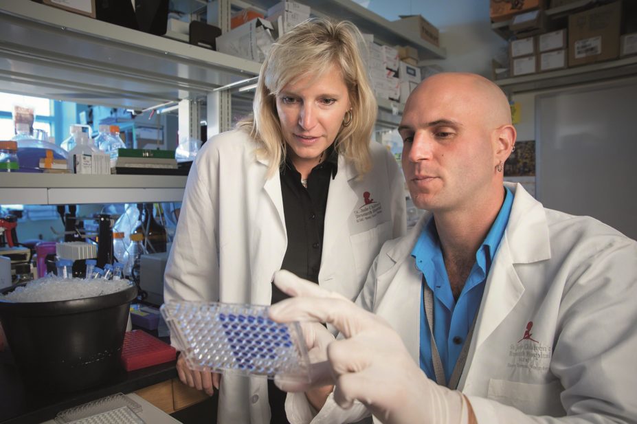 The researchers Dr Stacey Schultz-Cherry and Dr Erik Karlsson in their laboratory