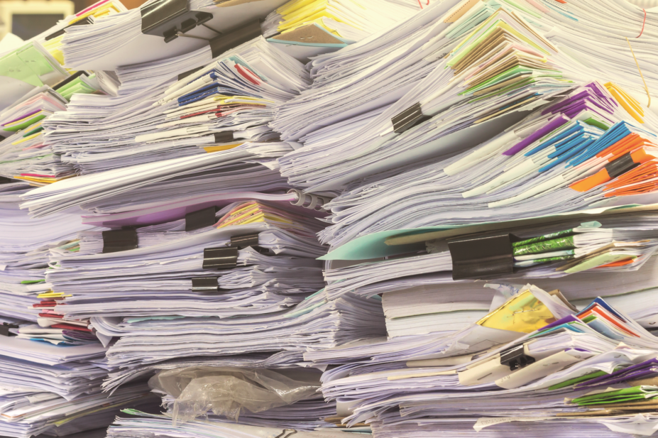 Stacks of paper reports