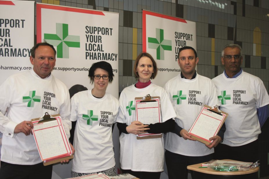 Members of the National Pharmacy Association (NPA) and Pharmaceutical Services Negotiating Committee (PSNC) during the signing of the petition against the community pharmacy cuts at Elephant and Castle shopping centre in London