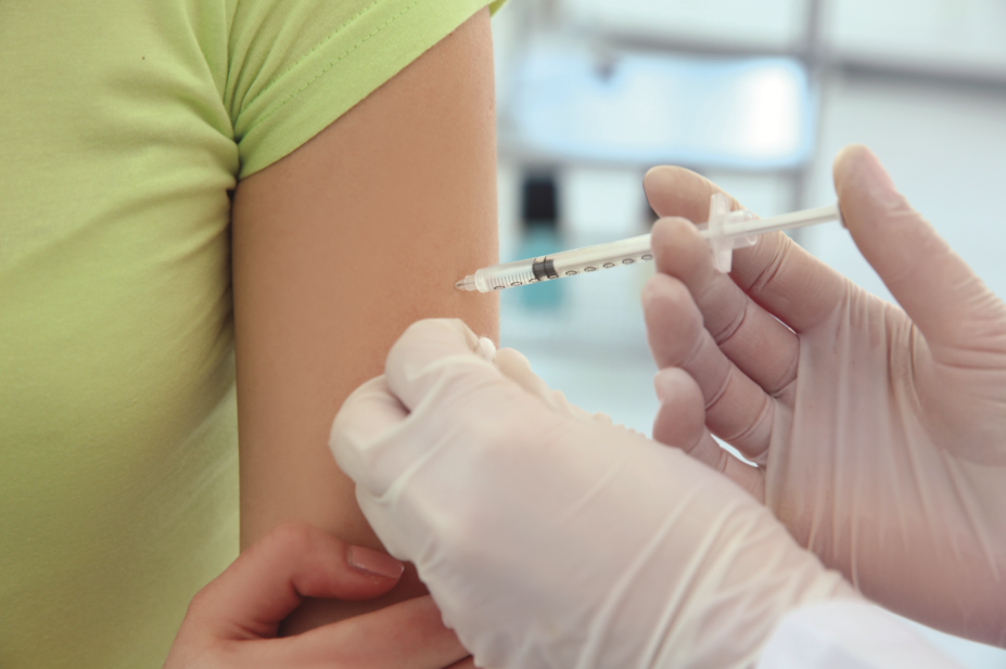 Teenage girl receiving HPV vaccine