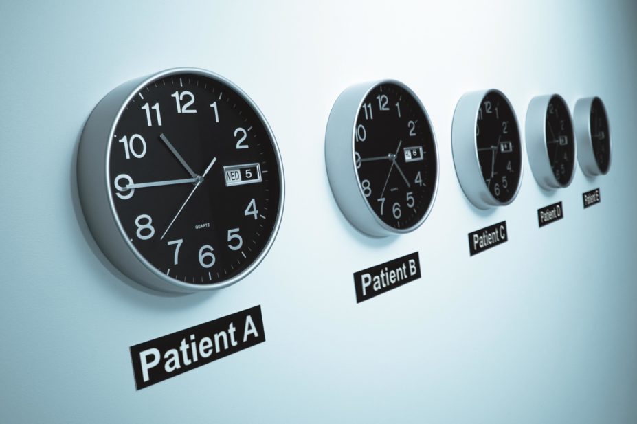 Five clocks, similar to time zone clocks, indicating different patients symbolising the concept of chronotherapy