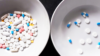 2 plates with different amounts of pills