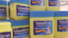 Close up of Vaseline tubs in store