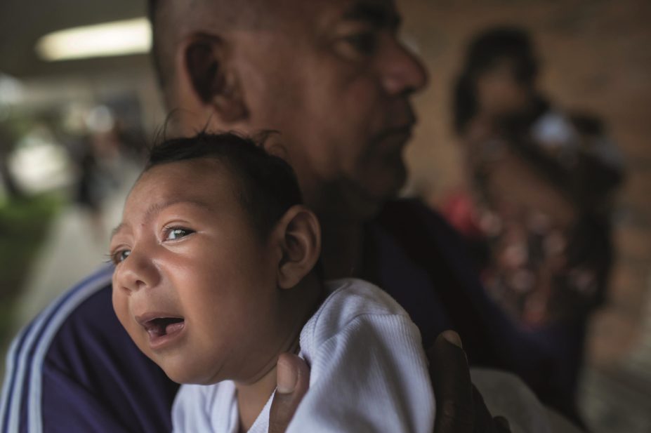 Pregnant women and those with severe chronic illness should consult a health professional before travelling to areas where Zika virus (ZIKV) outbreaks are reported. In the image, a 1-month old Brazilian baby suffering from microcephaly
