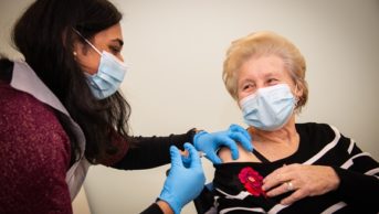 Patricia Main receives her first covid 19 vaccine at boots