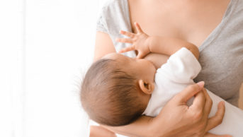 mother breastfeeding baby