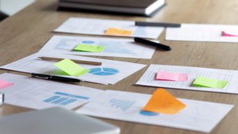 Close up paper marketing research reports on table