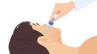 cartoon hand squeezing pipette into man's ear