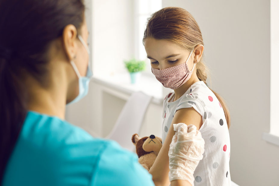Girl receiving vaccination