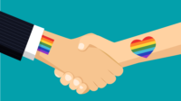Shaking hands with NHS rainbow and LHBTQ rainbow tattoos