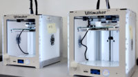 Two three dimensional printers that extrude polylactic acid (PLA) plastic to print objects.
