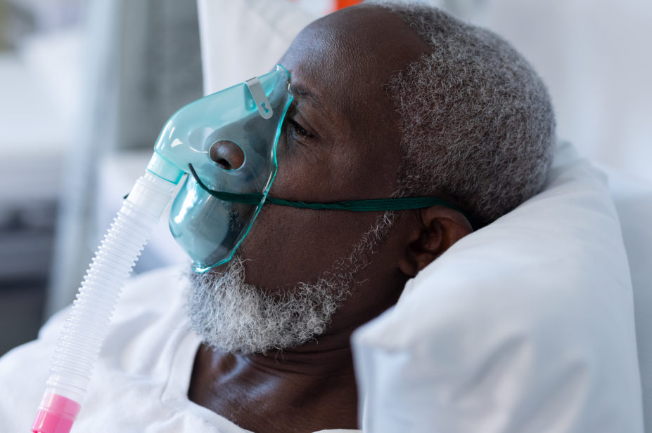 male patient wearing ventilator in hospital