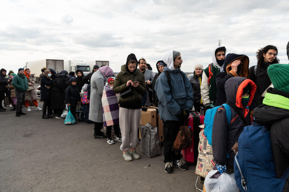 Ukrainian refugees arriving at the Ukrainian border at Poromna Pereprava, to pass into Romania