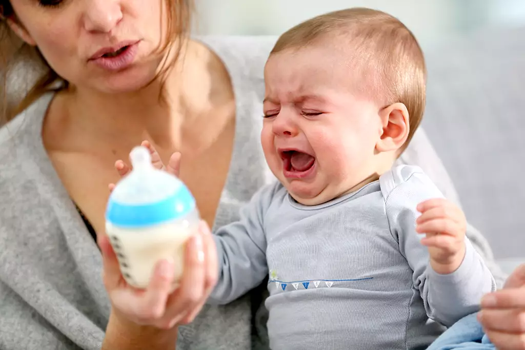 Mother with crying baby