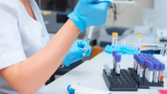 laboratory assistant working with blood tests