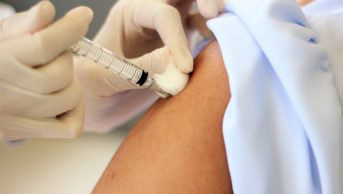 Intramuscular injection being carried out