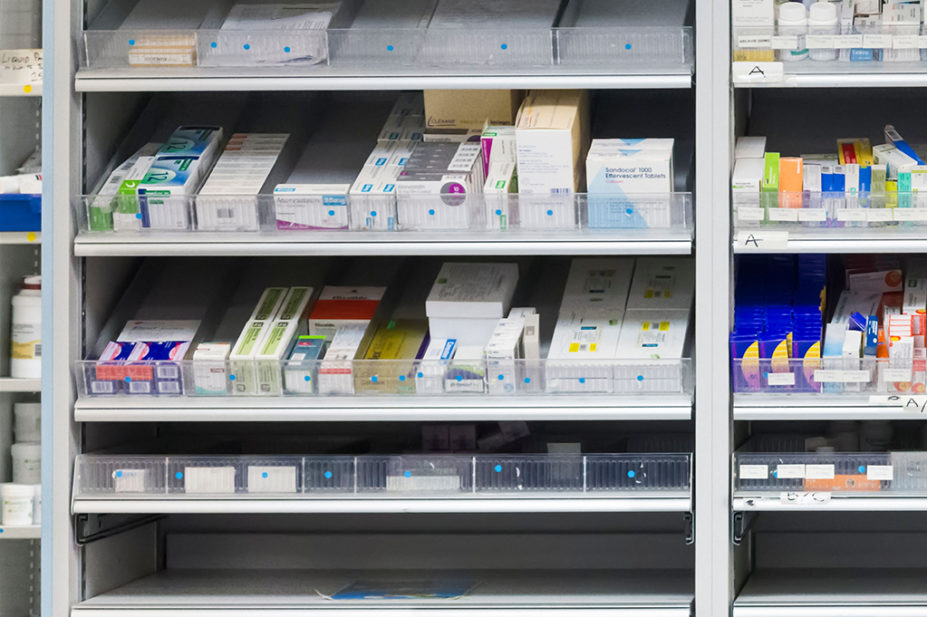 Medicines on shelves at a UK pharmacy