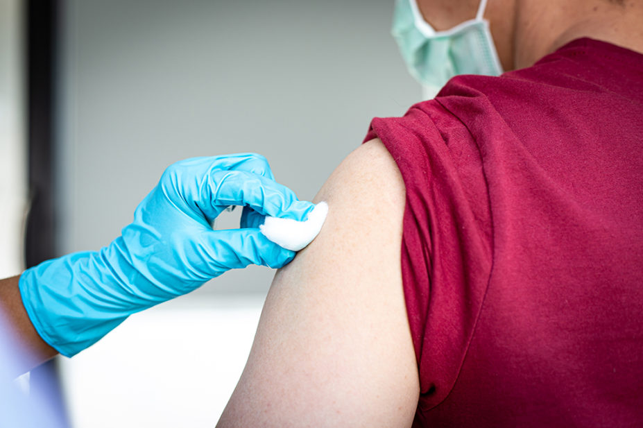 Pharmacist administering a vaccination