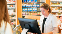 pharmacist looking at computer