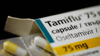 tamiflu box with blister pack of tablets