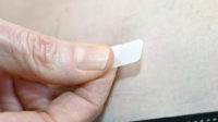Hormone replacement therapy (HRT) transdermal patch on skin