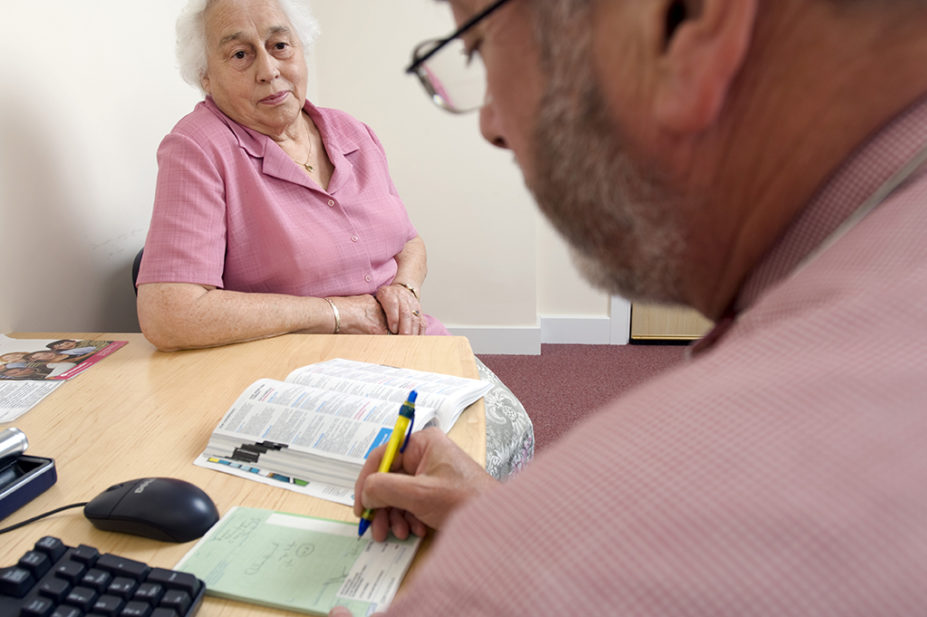 Pharmacist prescriber issuing a prescription to a patient