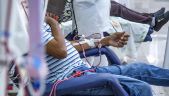 Person having dialysis in hospital