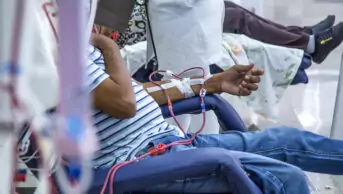 Person having dialysis in hospital