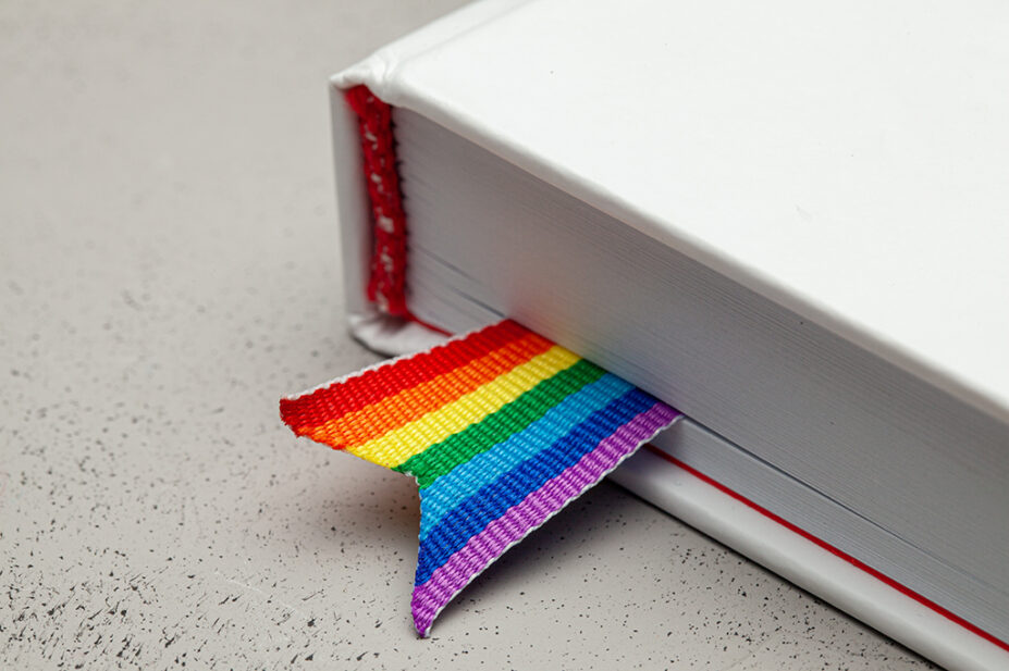 Book with rainbow bookmark