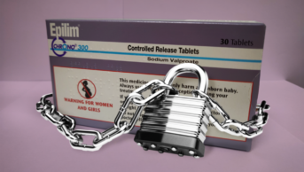 A box of sodium valproate tablets locked behind chain and padlock.