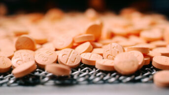 Anticoagulant pills moving on production line