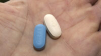 Tablets of the antiretroviral drugs nevirapine (white) and tenofovir (blue), used to treat AIDS