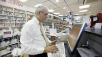 pharmacist on computer