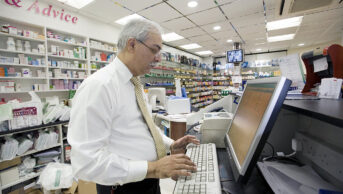 pharmacist on computer