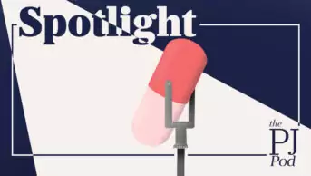 Illustration of a microphone made out of a pill under a spotlight