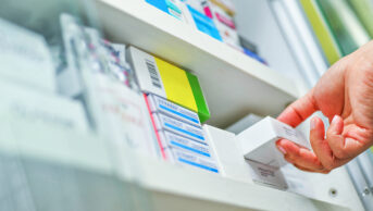 medicine products on pharmacy shelf