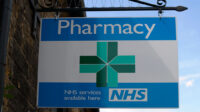 Pharmacy sign with green cross
