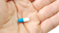 atomoxetine capsule in hand
