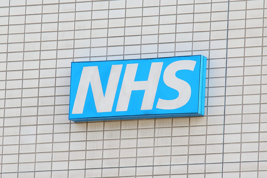 NHS logo on an external wall
