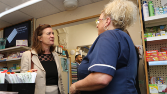eluned morgan speaking to staff member at electronic prescription launch
