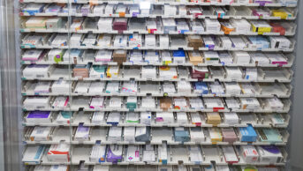 Pharmacy robotic medicine cabinet with some empty shelves