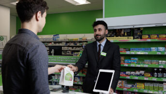 A patient using the Pharmacy First service in Superdrug on Strand, central London