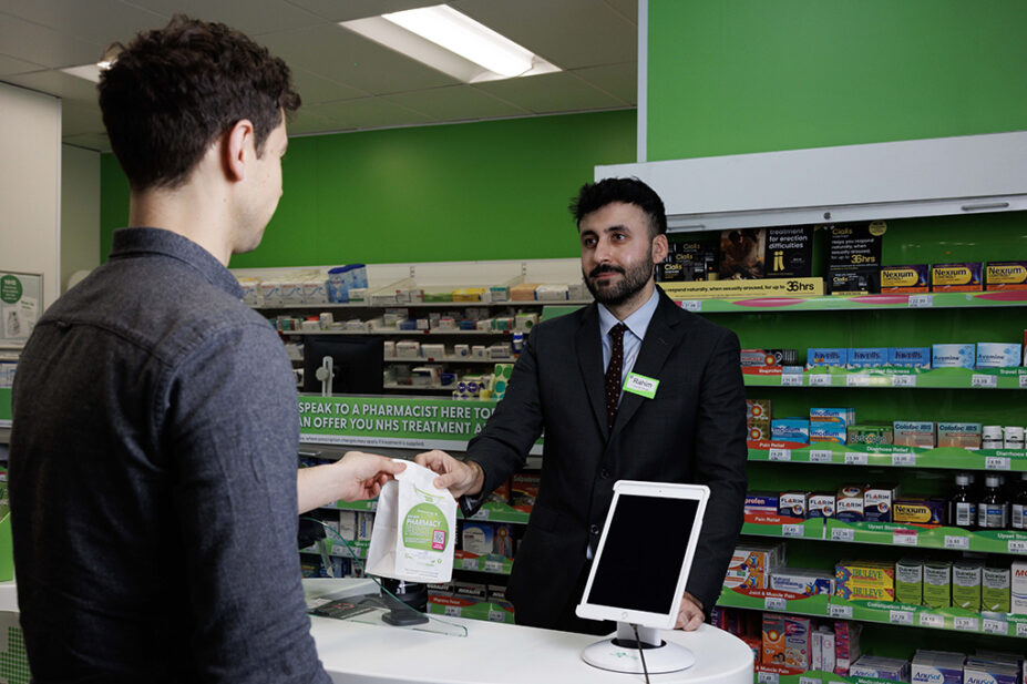 A patient using the Pharmacy First service in Superdrug on Strand, central London