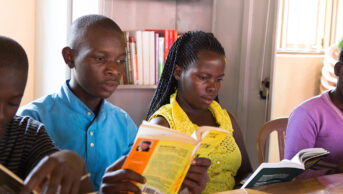 Ugandan students reading