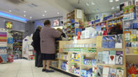 two older women at pharmacy counter