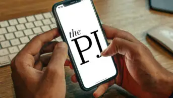 Photo of a person opening the PJ app on their phone