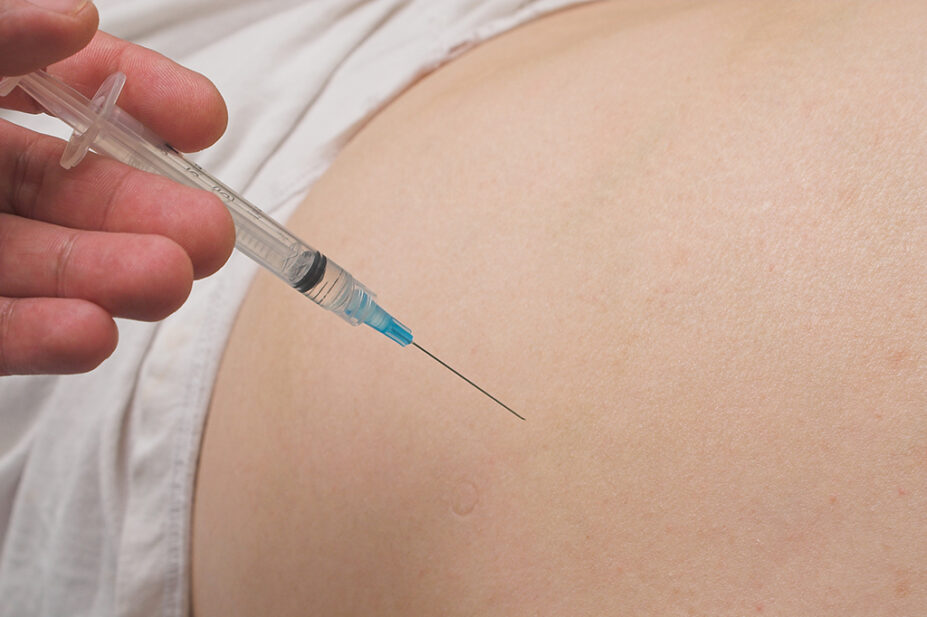 injection being held above skin